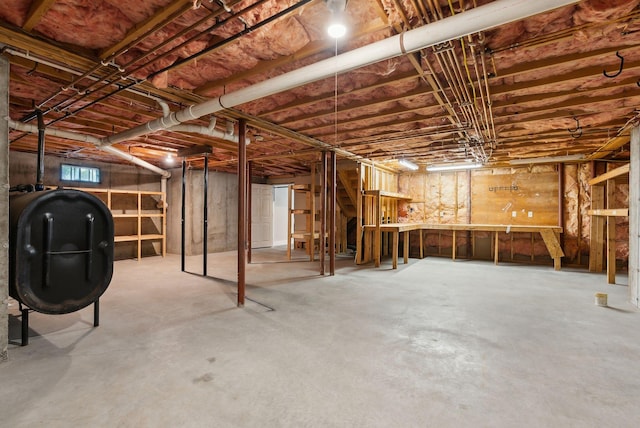 31 Green Trees Dr, Gorham, ME 04038 - unfinished basement with oil tank and stairs