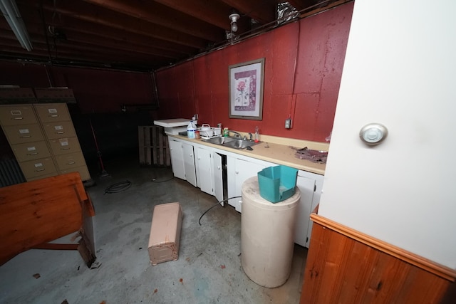 48 Customs Loop, Houlton, ME 04730 - below grade area featuring a garage and a sink