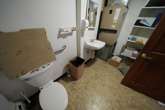 48 Customs Loop, Houlton, ME 04730 - bathroom featuring toilet and a sink