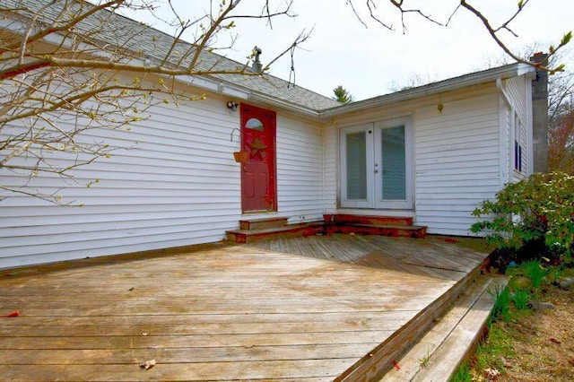 wooden terrace featuring french doors and entry steps