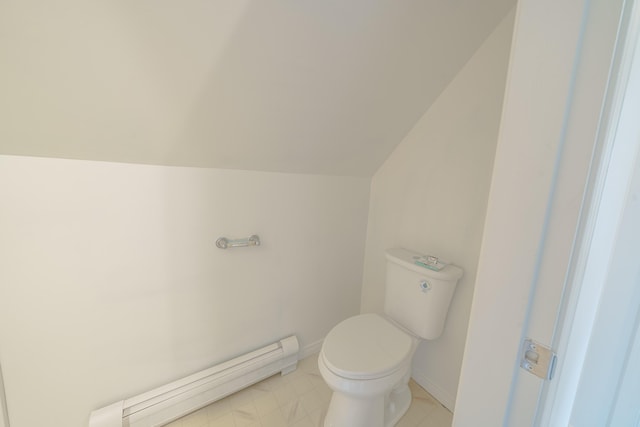 452 Moosehead Trl, Waldo, ME 04915 - bathroom with baseboard heating, toilet, vaulted ceiling, and baseboards