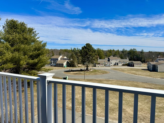 balcony featuring a residential view
