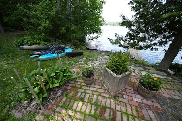 92 Spaulding Lake Rd, Oakfield, ME 04763 - view of yard with a water view and a patio area
