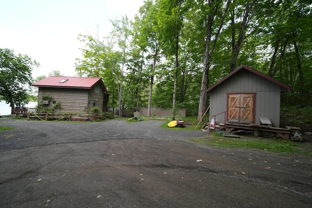 92 Spaulding Lake Rd, Oakfield, ME 04763 - view of asphalt driveway