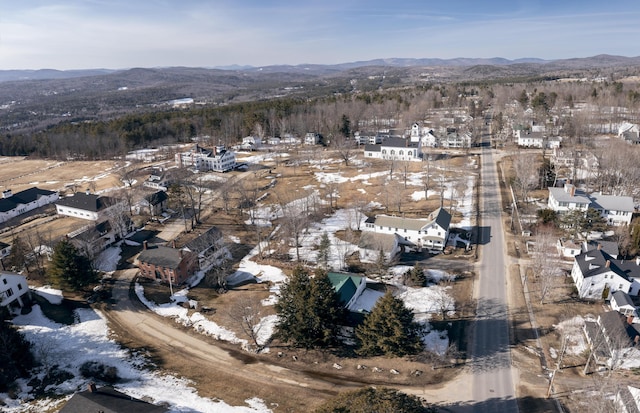 drone / aerial view with a residential view and a mountain view