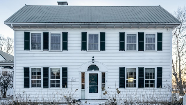 view of front facade featuring metal roof