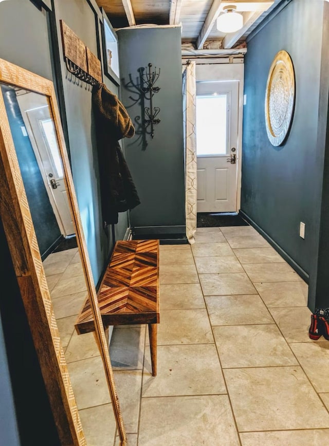 37 Bond St, Bangor, ME 04401 - doorway with beam ceiling and tile patterned flooring