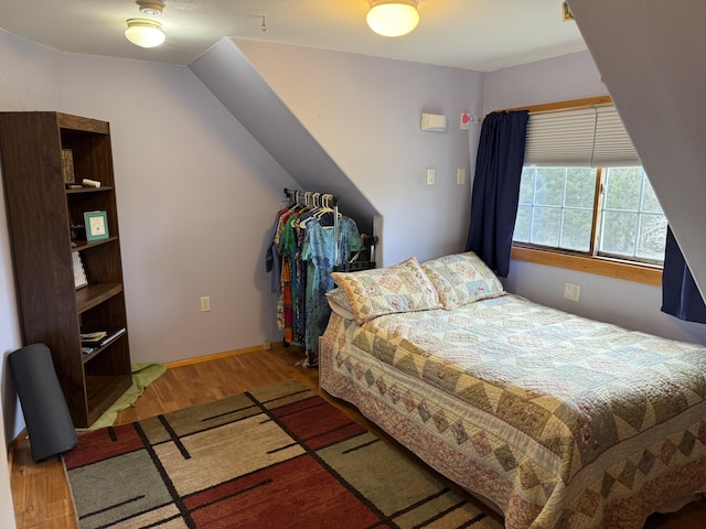148 Pendleton Point Rd, Islesboro, ME 04848 - bedroom featuring wood finished floors and baseboards