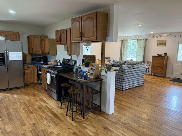 148 Pendleton Point Rd, Islesboro, ME 04848 - kitchen with stainless steel appliances, plenty of natural light, light wood-type flooring, and recessed lighting
