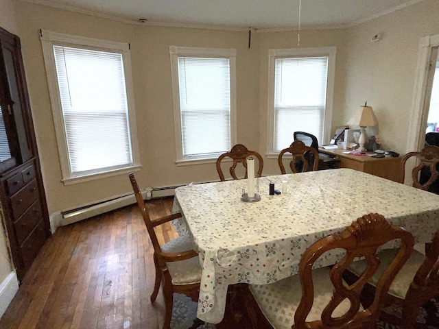 613 Washington Ave, Portland, ME 04103 - dining room featuring crown molding, hardwood / wood-style floors, and a healthy amount of sunlight