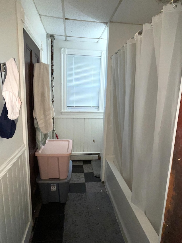 613 Washington Ave, Portland, ME 04103 - full bathroom with a baseboard radiator, wainscoting, and shower / bath combination with curtain