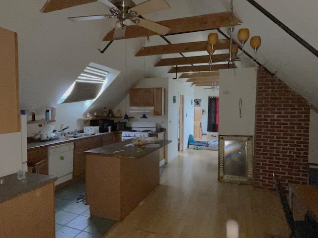 613 Washington Ave, Portland, ME 04103 - kitchen featuring ceiling fan, lofted ceiling with beams, a sink, white appliances, and a kitchen island
