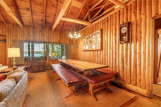 dining area with wood walls, wooden ceiling, a chandelier, and beamed ceiling