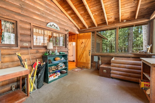 rec room featuring wooden ceiling, carpet, and log walls