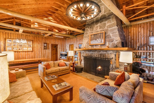 carpeted living area with a stone fireplace and a chandelier
