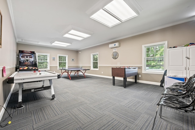 recreation room with baseboards, crown molding, and carpet flooring