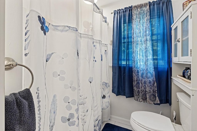 28 Poland Spring Rd, Auburn, ME 04210 - full bathroom featuring toilet, baseboards, and curtained shower