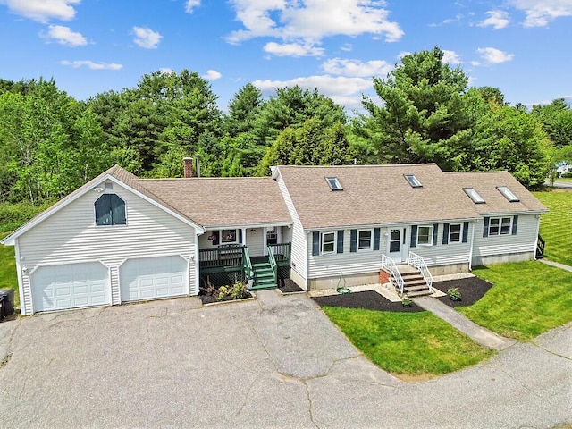 28 Poland Spring Rd, Auburn, ME 04210 - view of front of property with a garage, a shingled roof, driveway, a front yard, and a chimney