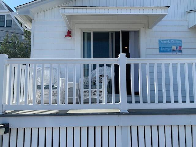 542 Ocean Ave, Wells, ME 04090 - wooden terrace with radiator heating unit