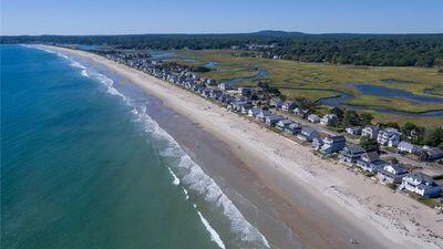 542 Ocean Ave, Wells, ME 04090 - bird's eye view featuring a water view and a beach view