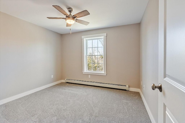 empty room with baseboards, baseboard heating, carpet, and a ceiling fan