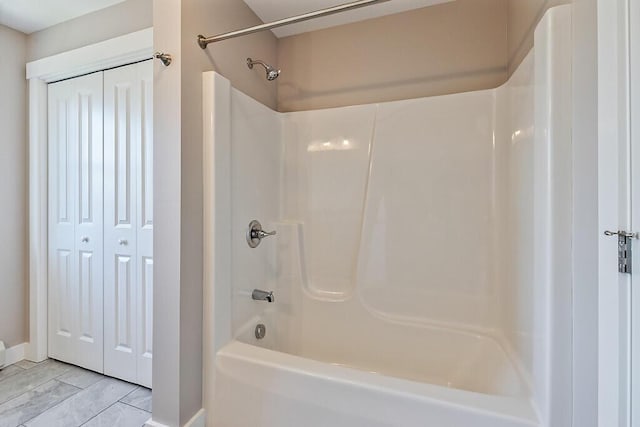 full bath featuring bathtub / shower combination