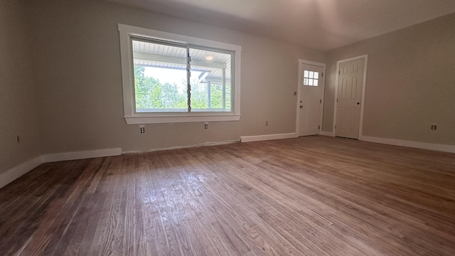 81 Maple Ridge Rd, Harrison, ME 04040 - unfurnished living room with wood finished floors and baseboards
