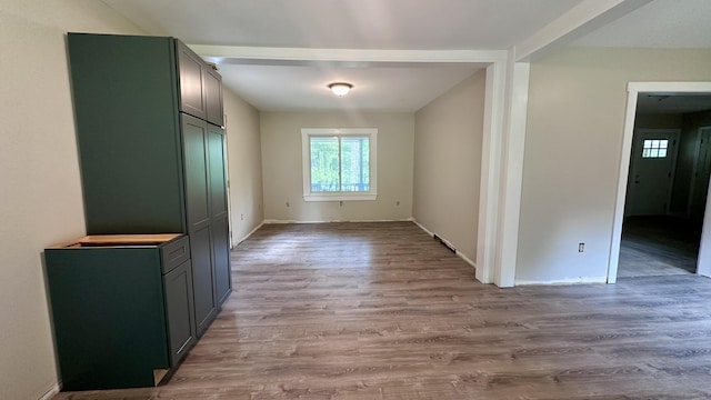 81 Maple Ridge Rd, Harrison, ME 04040 - unfurnished dining area featuring wood finished floors and baseboards