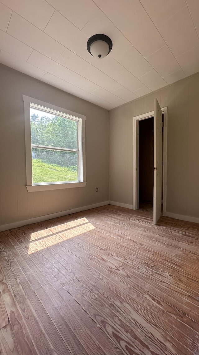 81 Maple Ridge Rd, Harrison, ME 04040 - unfurnished room featuring wood finished floors and baseboards