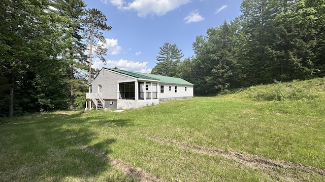 81 Maple Ridge Rd, Harrison, ME 04040 - view of side of home featuring a yard