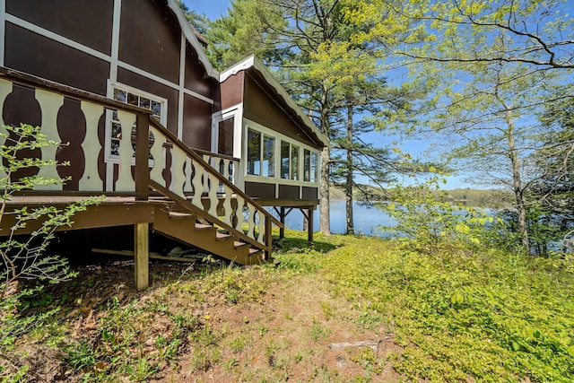 122 Oak Point Ln, Union, ME 04862 - view of property exterior featuring stairway and a deck with water view