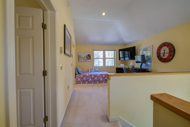 bedroom with lofted ceiling, light carpet, recessed lighting, and baseboards