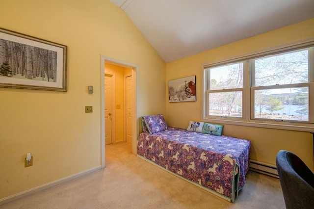 carpeted bedroom featuring a baseboard heating unit, multiple windows, vaulted ceiling, and baseboards