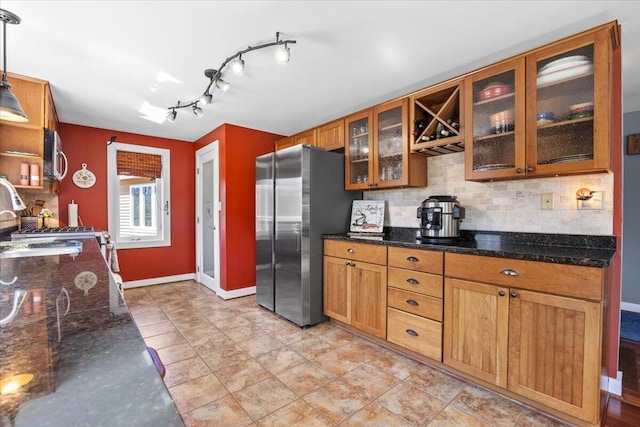 374 Youngs Ridge Rd, Acton, ME 04001 - kitchen featuring stainless steel appliances, tasteful backsplash, glass insert cabinets, and hanging light fixtures