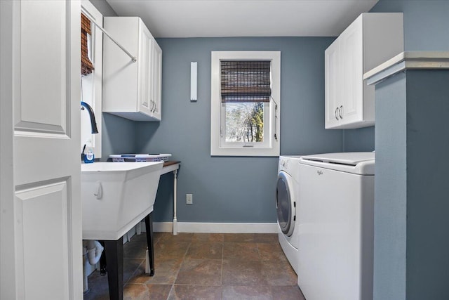 374 Youngs Ridge Rd, Acton, ME 04001 - clothes washing area with washer and clothes dryer, cabinet space, and baseboards