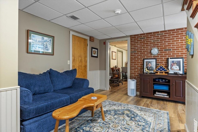 374 Youngs Ridge Rd, Acton, ME 04001 - living area featuring light wood-style floors and wainscoting