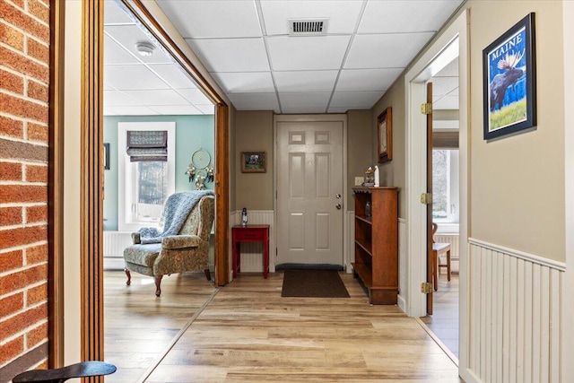374 Youngs Ridge Rd, Acton, ME 04001 - entryway featuring a paneled ceiling and light wood-type flooring