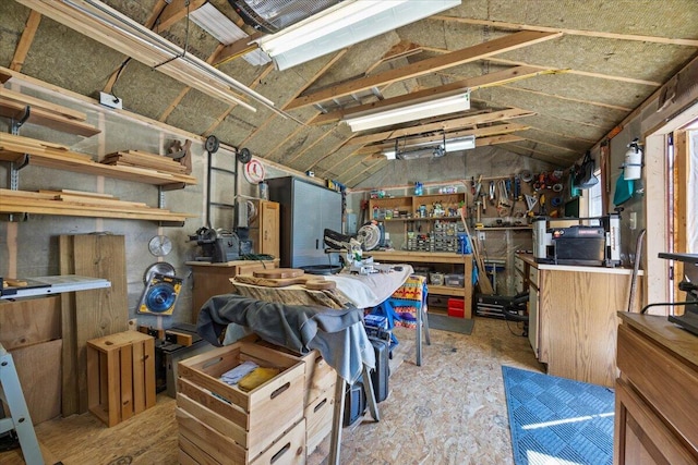 374 Youngs Ridge Rd, Acton, ME 04001 - misc room with vaulted ceiling and a workshop area
