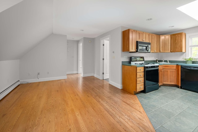 72 Natures Way, Wells, ME 04090 - kitchen featuring black appliances, a sink, light wood-type flooring, recessed lighting, and baseboards