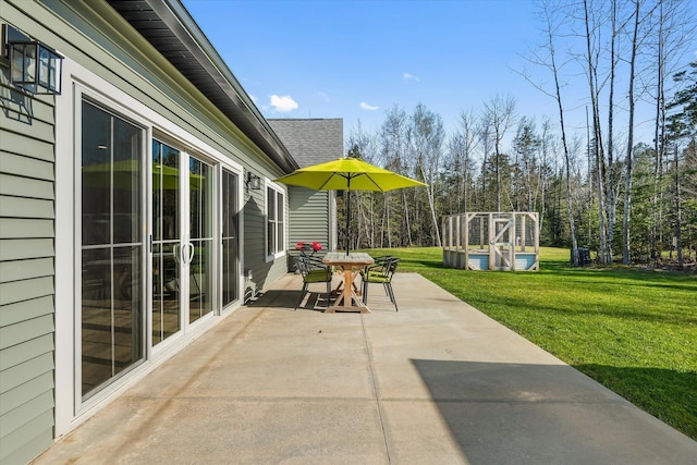 view of patio with outdoor dining area
