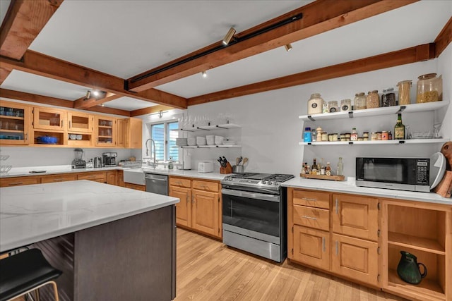 29 Penny Ln, Blue Hill, ME 04614 - kitchen featuring open shelves, light wood-type flooring, stainless steel appliances, beam ceiling, and light stone counters