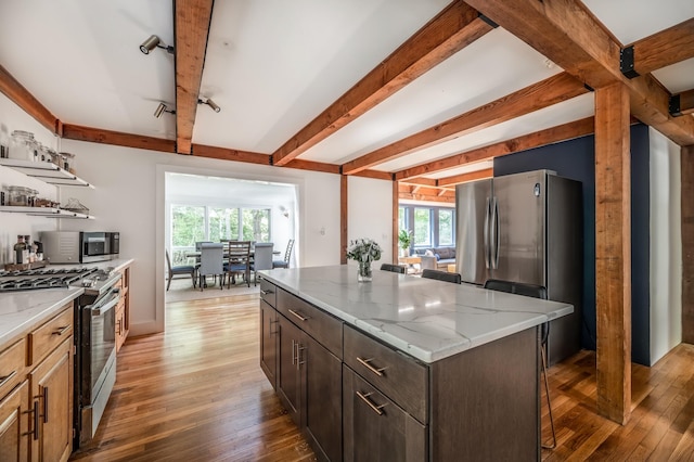 29 Penny Ln, Blue Hill, ME 04614 - kitchen featuring light wood-style flooring, plenty of natural light, stainless steel appliances, and beam ceiling