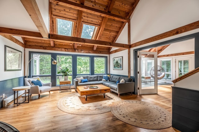 29 Penny Ln, Blue Hill, ME 04614 - living area featuring a skylight, wood finished floors, beam ceiling, and wood ceiling