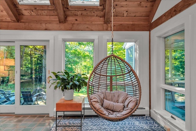 29 Penny Ln, Blue Hill, ME 04614 - interior space featuring tile patterned floors, lofted ceiling with skylight, wood ceiling, and a baseboard heating unit