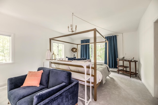 29 Penny Ln, Blue Hill, ME 04614 - carpeted bedroom with multiple windows and vaulted ceiling