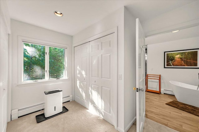 29 Penny Ln, Blue Hill, ME 04614 - foyer entrance with light wood-style flooring, a baseboard heating unit, and recessed lighting