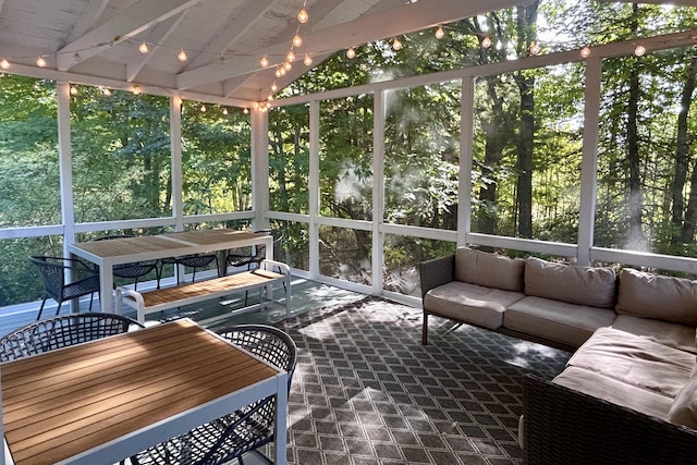 29 Penny Ln, Blue Hill, ME 04614 - sunroom / solarium with plenty of natural light, an outdoor hangout area, beamed ceiling, and outdoor dining space