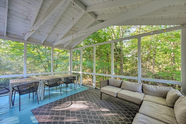 29 Penny Ln, Blue Hill, ME 04614 - unfurnished sunroom featuring a view of trees, outdoor dining area, beamed ceiling, and outdoor lounge area
