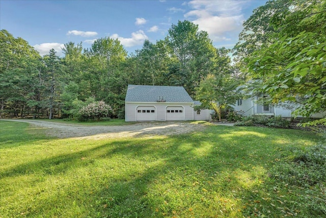 29 Penny Ln, Blue Hill, ME 04614 - view of yard with a detached garage