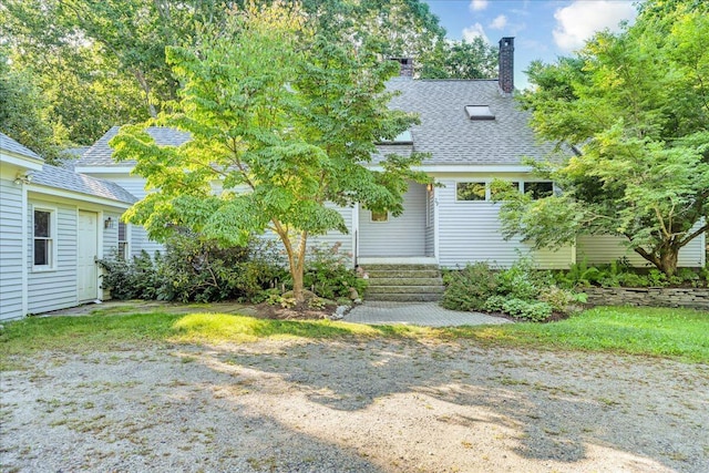 29 Penny Ln, Blue Hill, ME 04614 - view of front of home with a chimney and a shingled roof